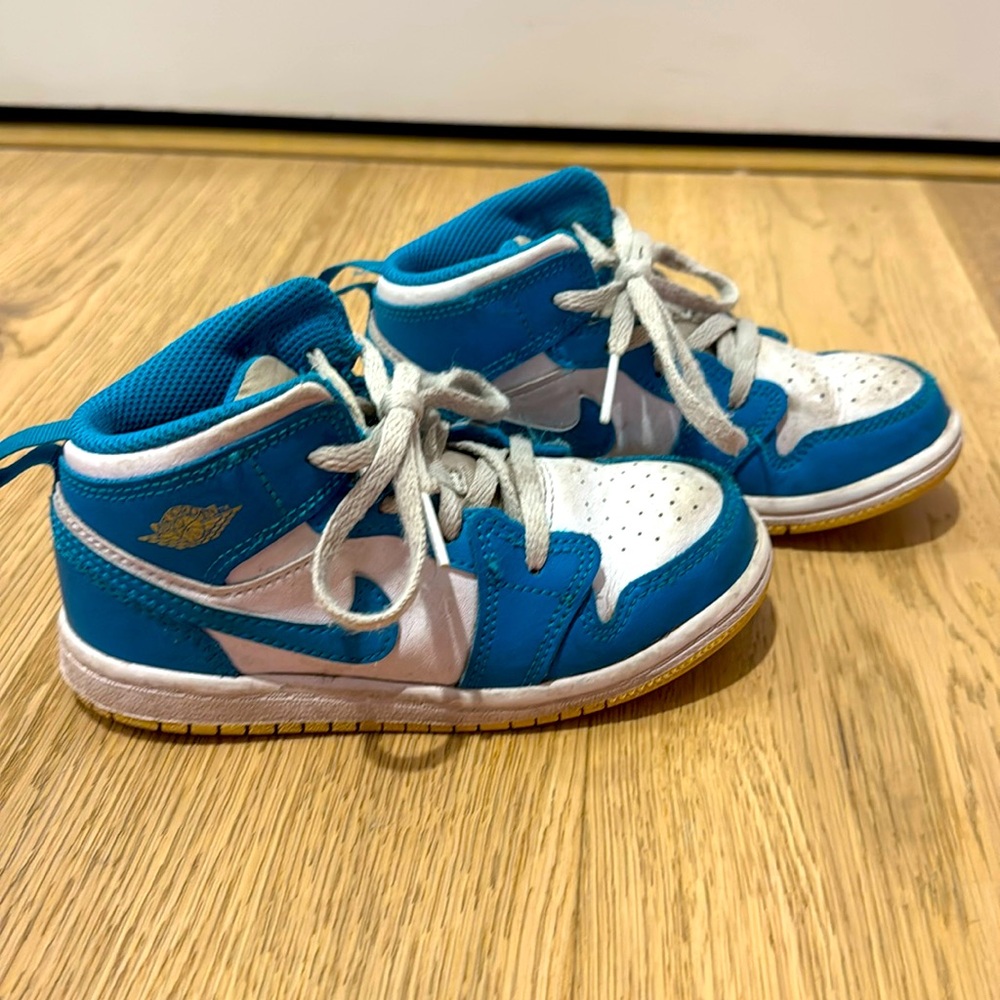 Teal and white kids air Jordan’s